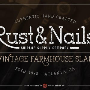 May include: A vintage-style graphic with the text "Rust & Nails" in a distressed white font. Additional text includes "Authentic Hand Crafted," "Shiplap Supply Company," and "Vintage Farmhouse Slab." The design is set against a dark background.