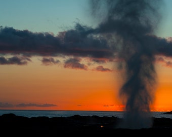 Spouting Horn, Hawaiian blowhole or geyser at sunset, Kauaʻi beach sunset
