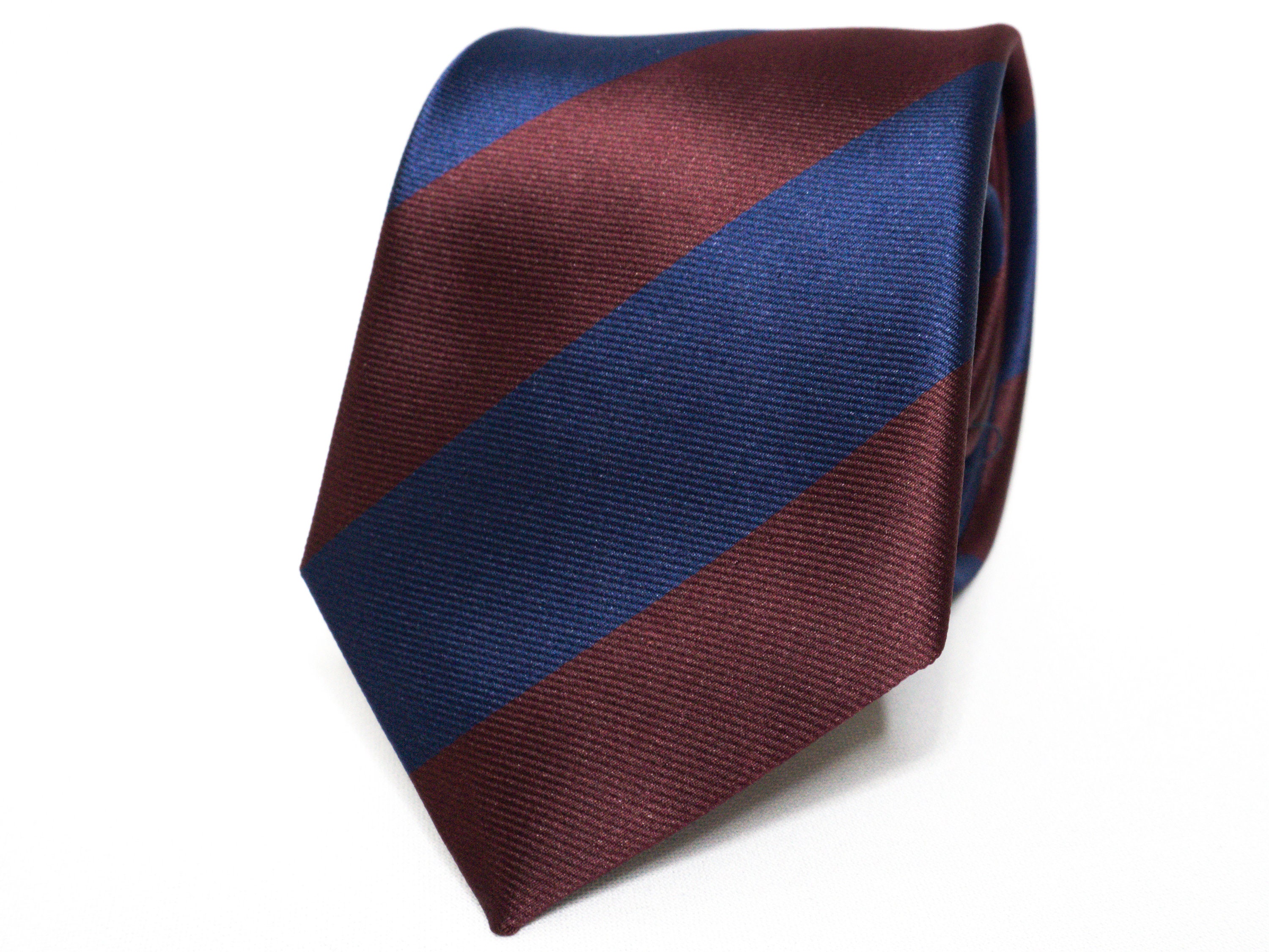 burgundy suit with navy tie