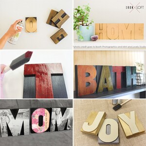 May include: A collection of wooden letters painted in various colors, including gold, red, black, and white. The letters spell out the words "HOME", "BATH", "MOM", and "JOY".
