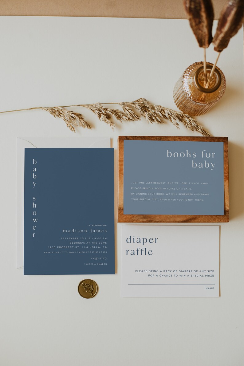 May include: A blue and white baby shower invitation with the text "baby shower" in vertical script. The invitation includes the name "madison james", the date and time of the event, and the location. The invitation also includes a request for guests to bring a book in place of a card, and a diaper raffle.