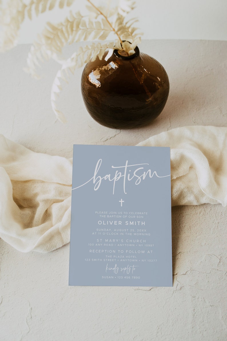 May include: A light blue invitation card with white text announcing a baptism for Oliver Smith. The card features a cross and the word "baptism" in cursive script. The event will take place on Sunday, August 25th at 11:00 AM at St. Mary's Church, followed by a reception at The Plaza Hotel.