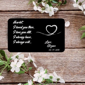 May include: Black card with a white heart and inscription: "Scarlet, I loved you then, I love you still, I always have, I always will... Love, Bryan 02-19-2019"