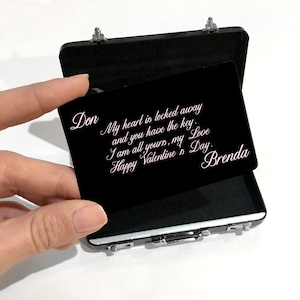 May include: A black briefcase with a message inside that reads "Don My heart is locked away and you have the key. I am all yours, my Love Happy Valentine's Day Brenda".