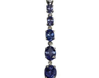 14KT W/G Oval Faceted Tanzanite And Diamond Pendant Ladder Style Pendant