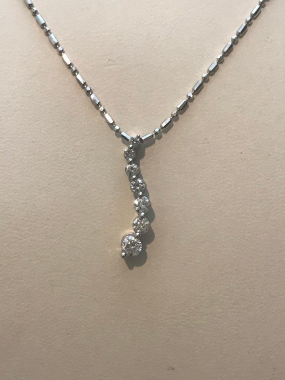 14kt. solid white gold Gem