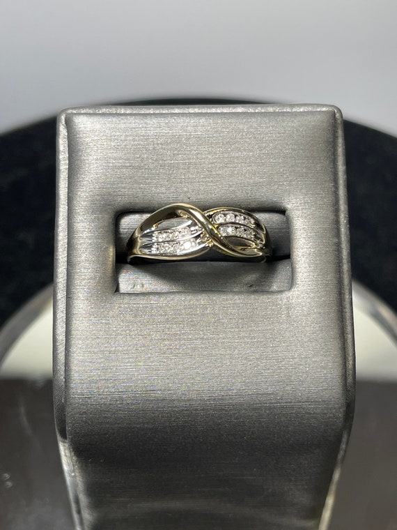 Ladies 14 Karat Gold Diamond Infinity Style Ring
