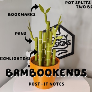 May include: A set of bamboo bookends in a bright orange pot. The pot is split into two sections, with the bamboo stalks growing out of the centre. The bookends are labelled "BAMBOOKENDS" and the pot has the words "POST-IT NOTES" written below it. The bamboo stalks are labelled with different uses, such as "BOOKMARKS", "PENS", and "HIGHLIGHTERS".