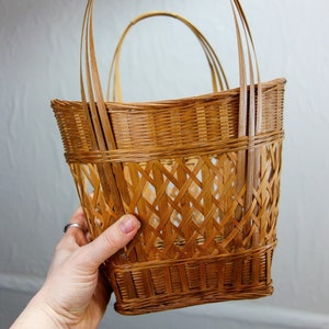 Vintage woven basket with handles 13 x 9.5 thin wicker rattan table top or decorative wall basket farmhouse decor wall hanging image 1