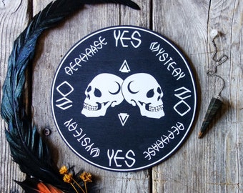 Witchy pendulum board 6.5" round wood divination tool in black & white with skull, occult altar wall art, witchcraft aesthetic, dark decor