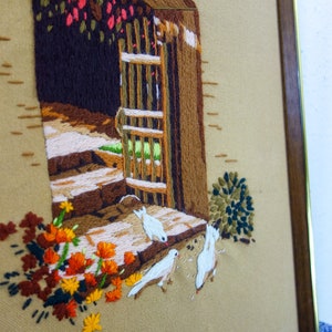Vintage framed crewel 19.25x 15.25 yarn needlework large 70s wall art with floral, doves, gate motif for cottagecore decor folk wood fiber image 5