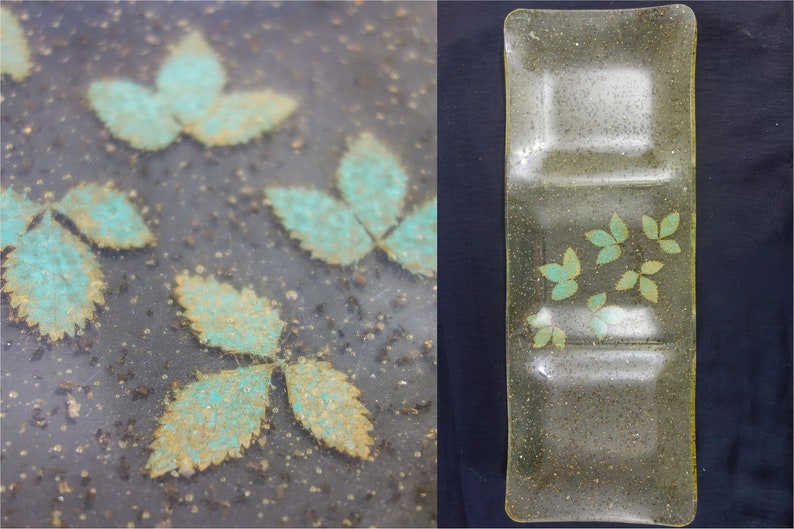 a vintage transparent snack tray embedded with gold flecks and green leaves