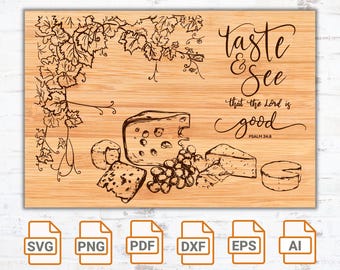 Puede incluir: Una tabla de cortar de madera con un diseño de vid y el texto "Taste & See that the Lord is good Psalm 34:8". La tabla también presenta un dibujo de queso y uvas.