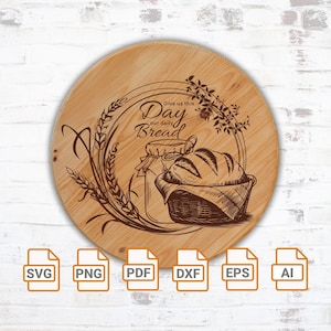 Könnte beinhalten: Ein rundes Holzschild mit einem Brot-Thema-Design. Das Schild zeigt eine Illustration eines Brotlaibs in einem Korb, ein Glas und Weizenähren. Der Text "Give us this day our daily bread" ist ebenfalls enthalten.
