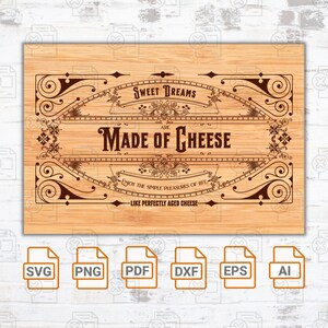 Puede incluir: Un letrero de madera marrón con un borde decorativo y el texto "Sweet Dreams Are Made of Cheese. Enjoy the simple pleasures of life - Like perfectly aged cheese."