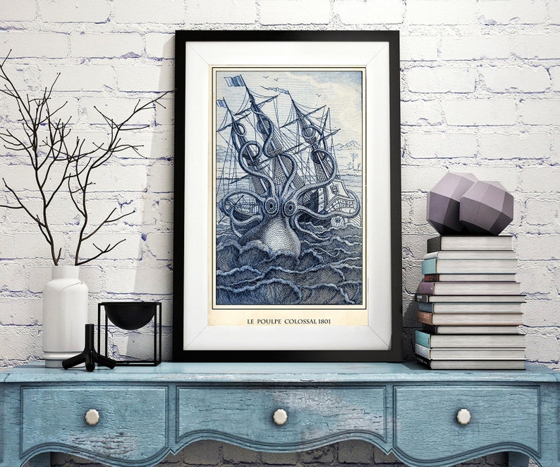 May include: A framed vintage illustration of a giant octopus attacking a ship. The image is in shades of blue and white and has the text "LE POULPE COLOSSAL 1801" at the bottom.