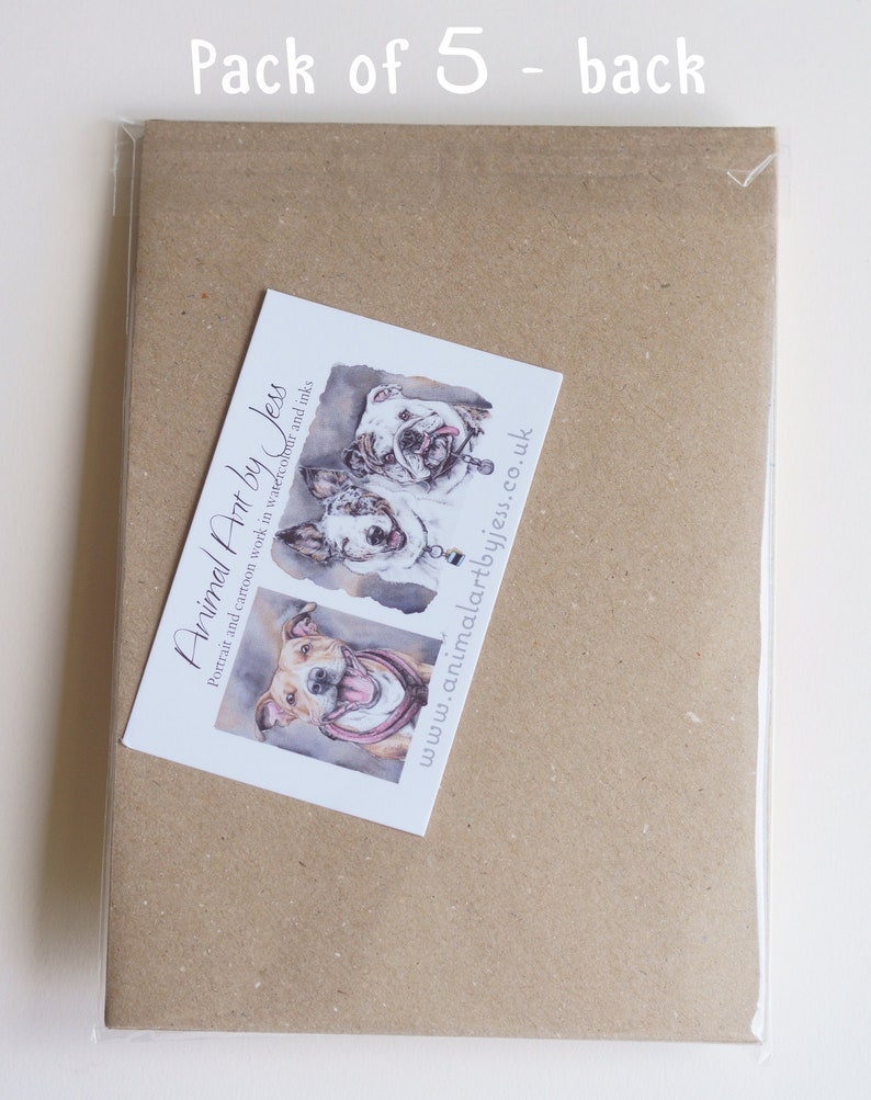 May include: A brown paper envelope with a white business card attached. The business card has a watercolor illustration of three dogs and the text "Animal Art by Jess" and "www.animalartbyjess.co.uk". The envelope has the text "Pack of 5 - back" printed on it.