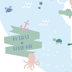 May include: A light blue and green world map with a green banner that says "My First World Map". The map is decorated with a pink anchor, a blue crab, a green turtle, a pink octopus, and white stars.