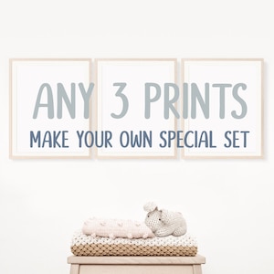 Puede incluir: Tres impresiones enmarcadas con el texto "ANY 3 PRINTS MAKE YOUR OWN SPECIAL SET" en letras azul claro sobre fondo blanco.