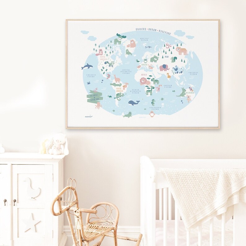 May include: A light blue world map with a white border, featuring illustrated animals from different continents. The map is framed in a light wood frame and is hanging on a white wall.