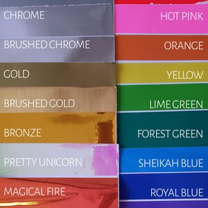 May include: A color chart with 12 different colors, including black, silver, chrome, brushed chrome, gold, brushed gold, bronze, pretty unicorn, magical fire, fairy blush, white, and wine. The colors are arranged in two columns, with the names of the colors printed below each swatch.
