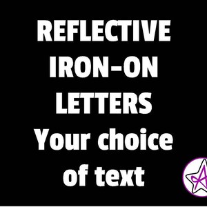 May include: Black background with white text that reads "Reflective Iron-On Letters Your choice of text". A purple star with a white outline is in the lower right corner.