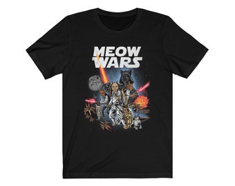 May include: Black t-shirt with a graphic of cats dressed as characters from Star Wars. The text "MEOW WARS" is printed in white above the graphic.