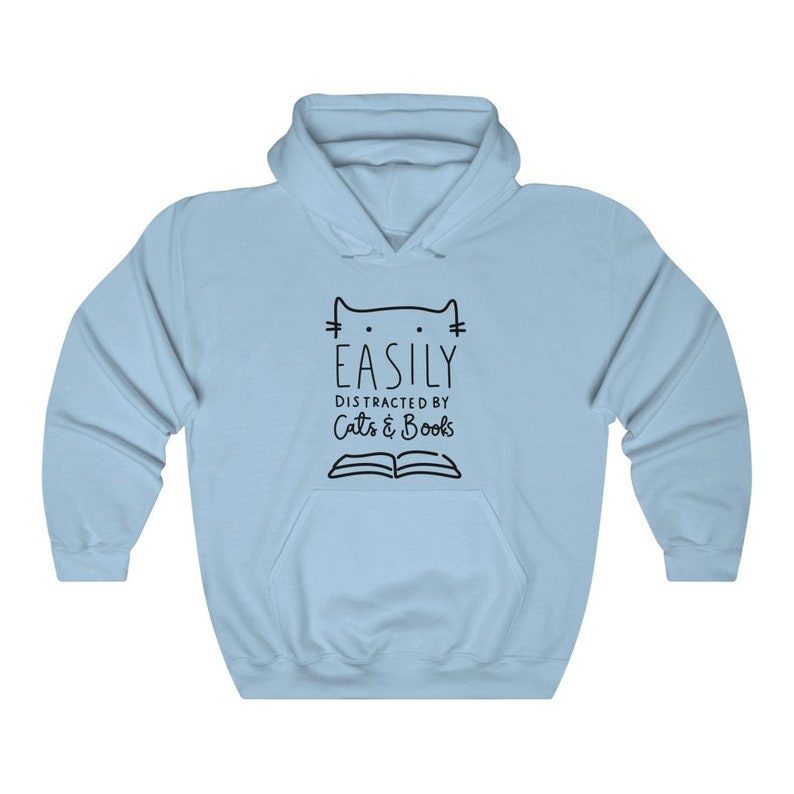 May include: Light blue hooded sweatshirt with a black graphic that says "Easily Distracted by Cats & Books" with a cat head and an open book.