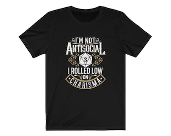 May include: Black t-shirt with a gold graphic that says "I'm not antisocial I rolled low on charisma" with a dice graphic showing a 3.