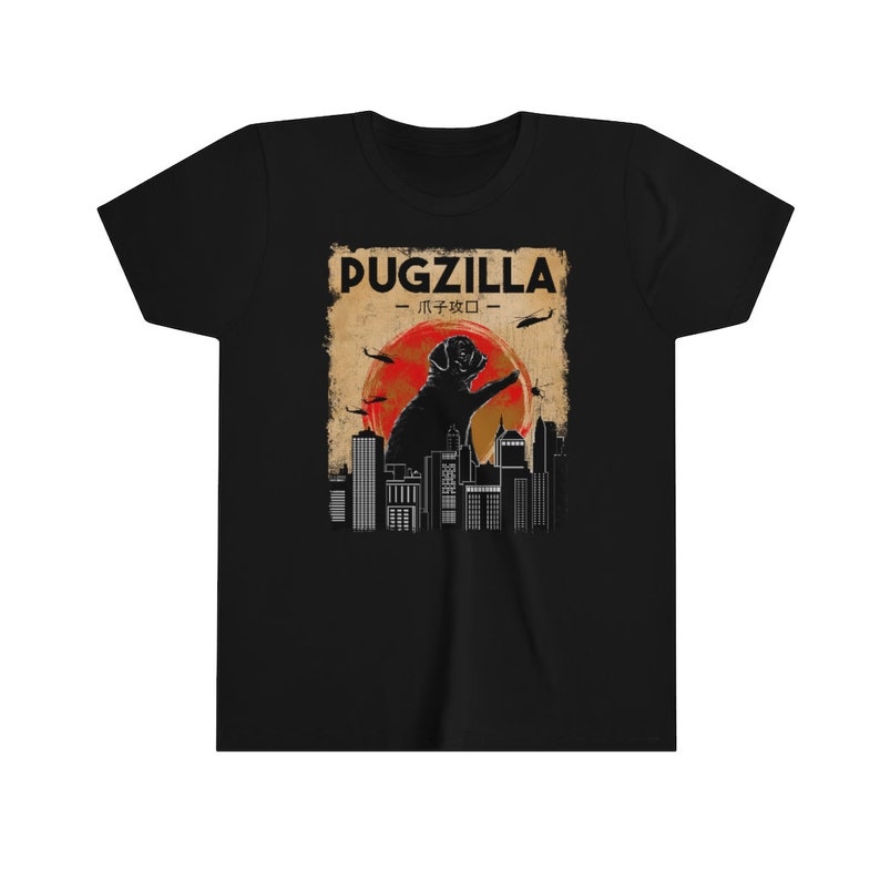 May include: Black t-shirt with a graphic of a pug standing on a city skyline with the text "Pugzilla -  パグジラ -" in a vintage style.