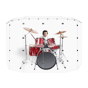 May include: A clear acrylic drum shield with a drummer playing a red drum set inside. The shield is made of multiple panels that are connected together.