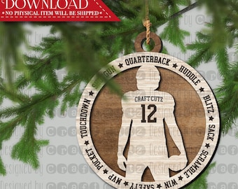 May include: A wooden Christmas ornament shaped like a football player with the text "CRAFT CUTZ 12" on the front. The ornament is decorated with stars and the words "Quarterback", "Huddle", "Blitz", "Sack", "Touchdown", "Pocket", "MVP", "Safety", "Win", and "Scramble".