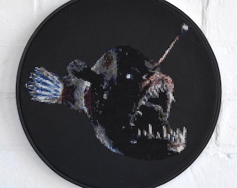 Patrón de punto de cruz de pez rape