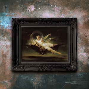 May include: A framed artwork featuring a classical depiction of a figure riding a bat. The figure is draped in flowing fabric, with a dark background. The ornate black frame adds a vintage aesthetic to the piece.