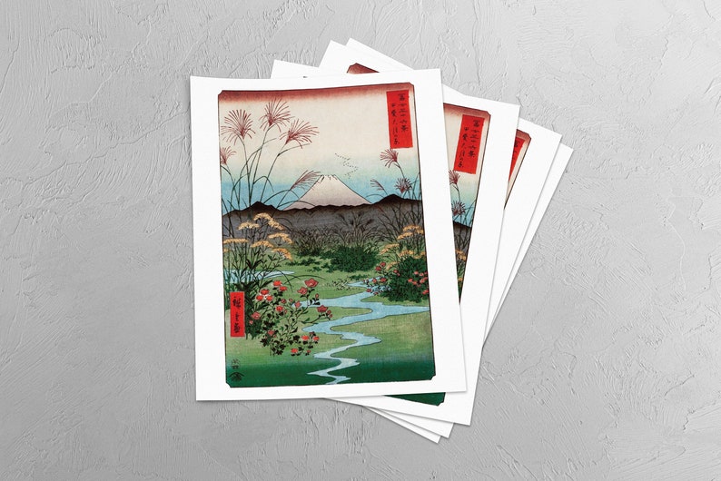 May include: A set of five prints featuring a Japanese landscape with Mount Fuji in the background. The prints are in a traditional Japanese style with a blue sky, green hills, and a winding river. The prints are framed in white and have a red border.