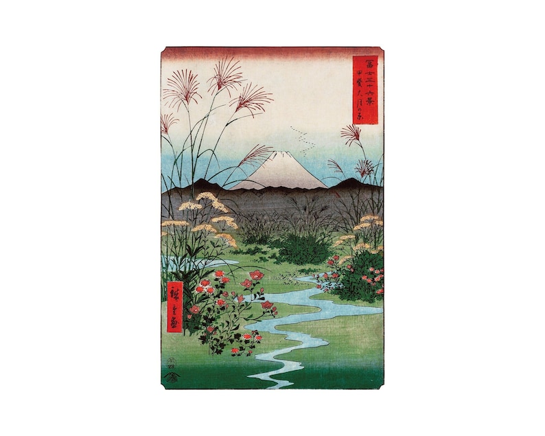 May include: A woodblock print depicting Mount Fuji in the distance, with a winding stream flowing through a field of flowers and tall grasses. The print is in shades of blue, green, and red, with a red seal in the upper right corner.