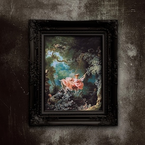 May include: A framed oil painting depicting a woman in a pink dress swinging on a rope swing in a lush green forest. The painting is set against a backdrop of blue sky and white clouds.