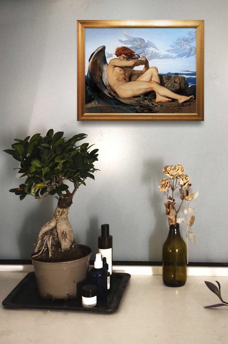 May include: A framed painting of a winged angel with red hair, sitting on a rock with a cloudy sky in the background.
