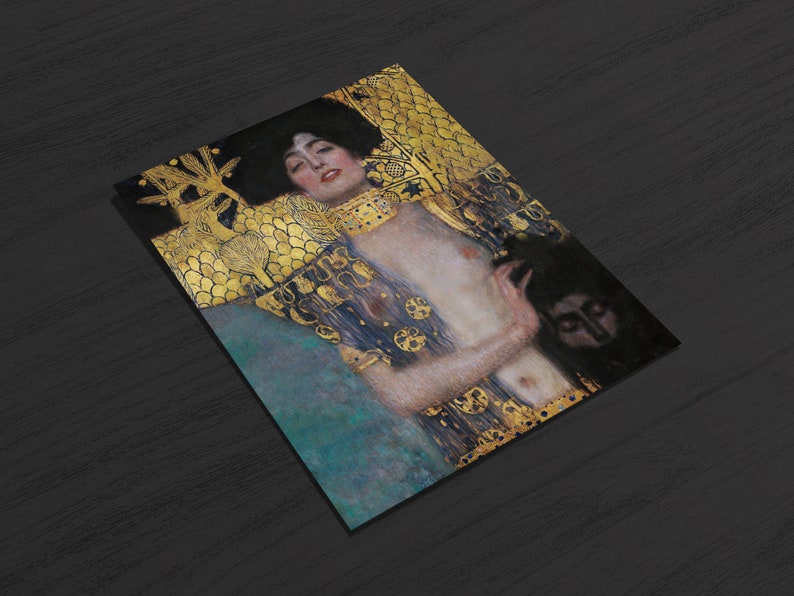 May include: A painting of a woman with long dark hair, wearing a gold and blue robe. She is holding a small figure in her hand. The background is a gold and blue pattern.