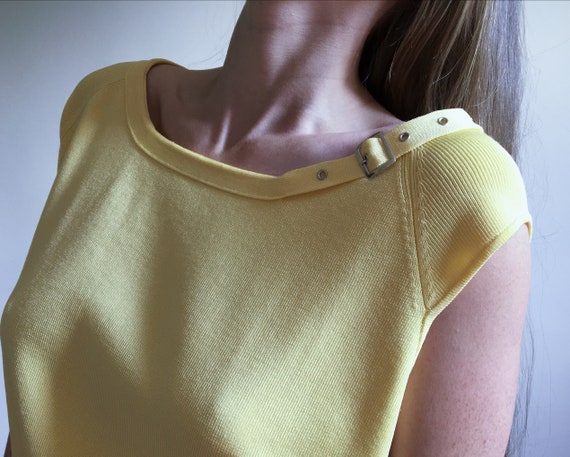 yellow buckle top