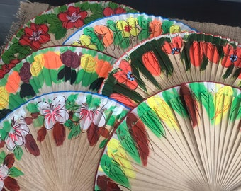 May include: A set of five hand-painted folding fans with floral designs. The fans are made of wood and paper and feature a variety of colors, including red, orange, yellow, green, and white.