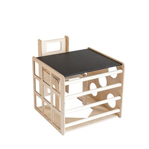 Studio product presentation of a cube table with an integrated chalkboard top.