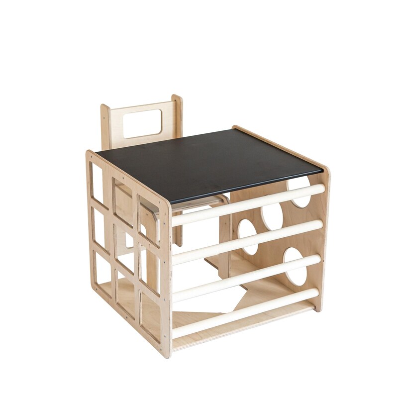 Studio product presentation of a cube table with an integrated chalkboard top.