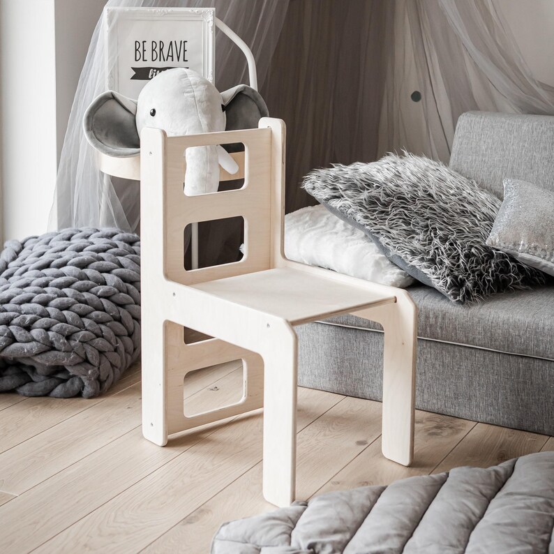 Matching cube chair designed for toddler ergonomics.