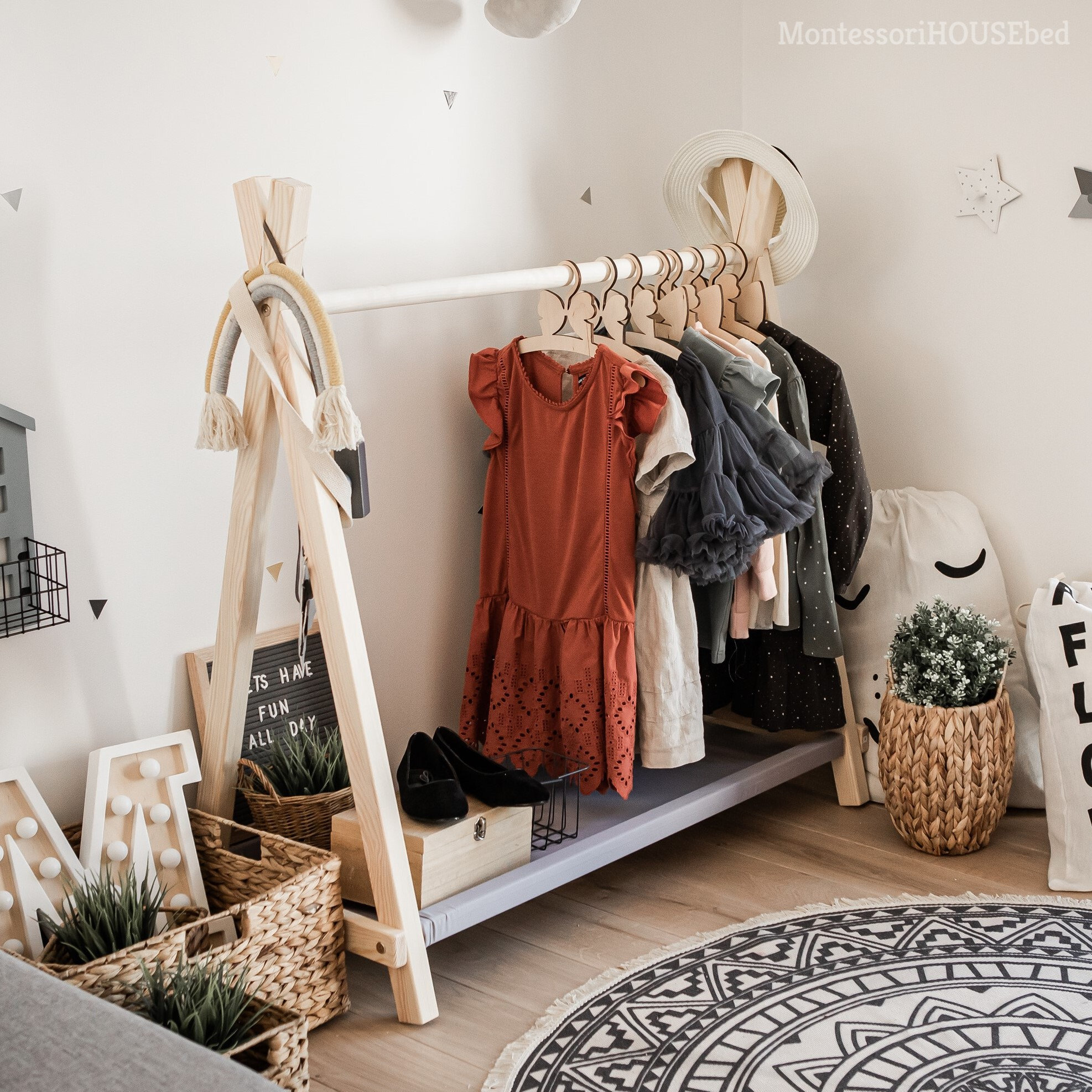 Premium Photo  Children clothing on hanger stand in dressing room