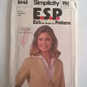 May include: A Simplicity Extra-Sure Pattern sewing pattern for a blazer, with a model wearing the blazer on the cover. The pattern number is 8445 and the price is 95 cents.
