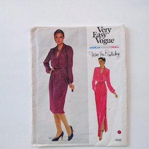 May include: Vintage sewing pattern for a dress by Diane Von Furstenberg. The pattern is for a long, wrap dress with a long sleeve. The pattern is from Very Easy Vogue, American Designer's Original, and the pattern number is 2332.