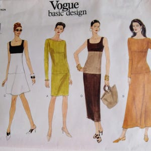 May include: Vogue basic design sewing pattern featuring four dress designs. The illustration shows a black and white dress, a yellow dress, a brown and tan dress, and a long-sleeved orange dress. The pattern number is 1920.