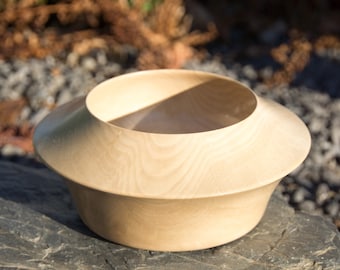 Small twisted deep bowl from the wood of the hornbeam