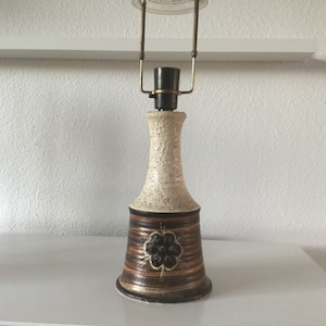 Rare find Vintage ceramic midcentury Batholdy lamp base with a fantastic pattern also in warm brown colors .
